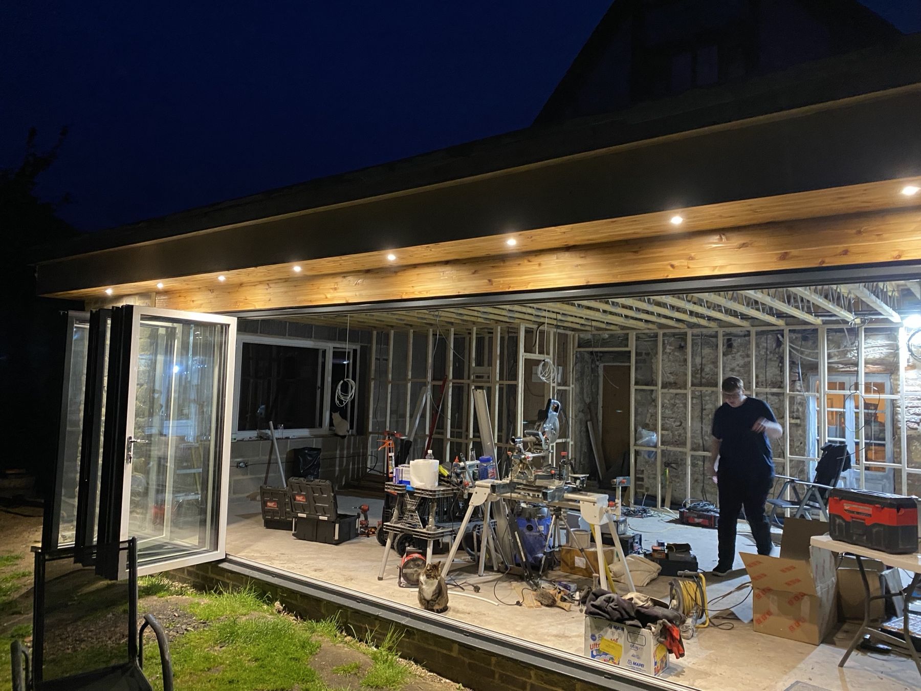 Rear extension at dusk — first and second fix
